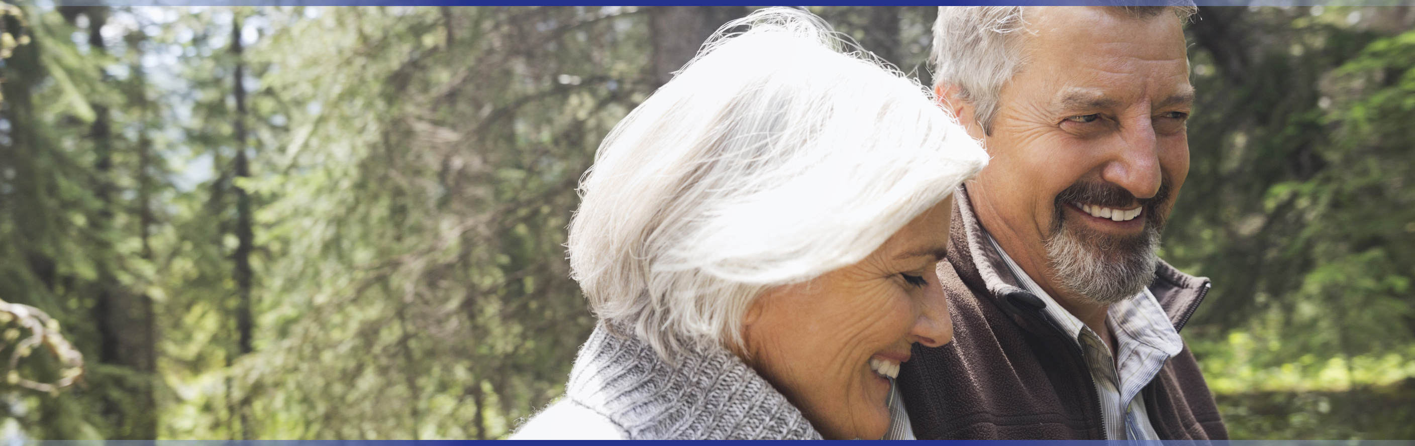 Elderly man and woman walking together